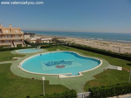Cullera Piso en un fantástico complejo residencial en primera linea al mar con piscina comunitaria en Cullera - Valencia 